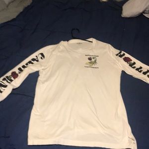 Long sleeve white T-shirt.